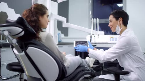 Sequence of Female Dentist Consulting Patient