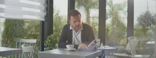 Relaxing with book in cafe