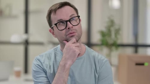 Portrait of Pensive Man Thinking