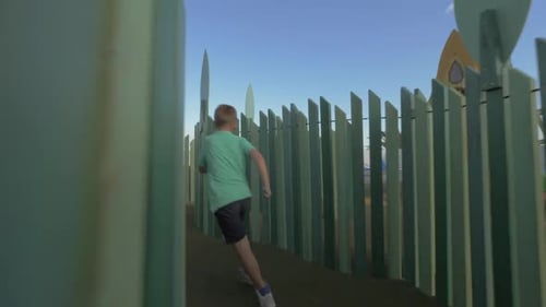 Boy Having Fun on Large Playground
