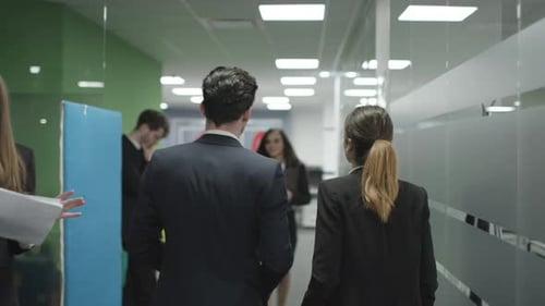 Business People Walking in Modern Office Building