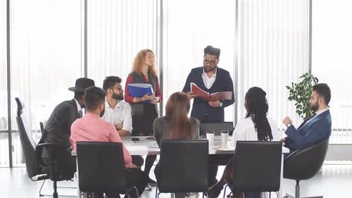 Diverse Team Having Meeting in Modern Office