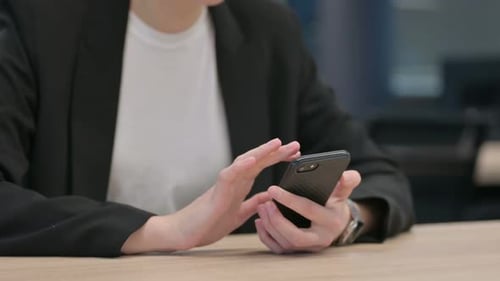 Close Up of Female Hands Using Smartphone