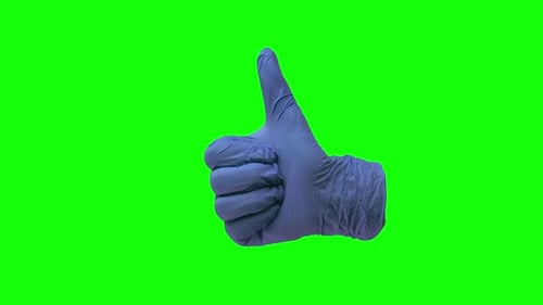 Gloved Hand Gives Thumbs Up on Green Screen