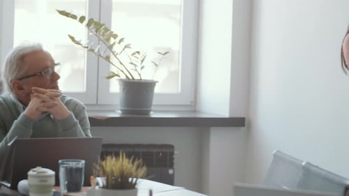 Business Presentation at Modern Workplace in Daytime