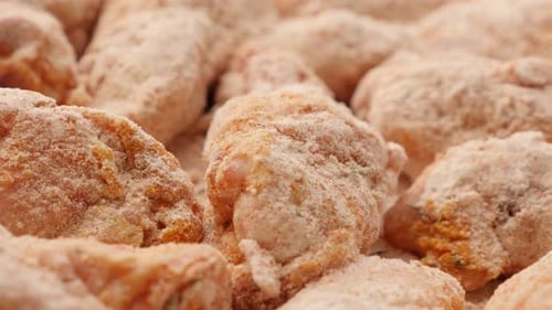 Raw chicken meat arranged and ready to beeing baked close-up 4K 2160p 30fps UltraHD panning footage