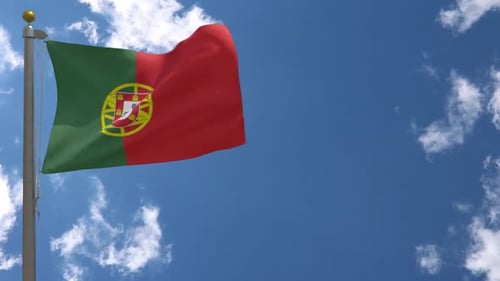 Waving Portugal Flag on a Blue Sky