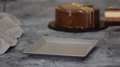 Serving Decadent Chocolate Cake Slice on Plate