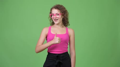 Woman Giving Thumbs Up with Pink Glasses