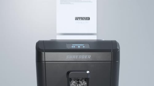 Front view at the paper shredder working. Documents shredding. Office. 4KHD