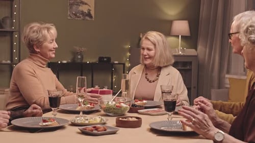 Seniors Celebrate Birthday at Dinner Table