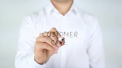 Writing Customer Care on Clear Surface