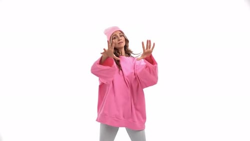 Woman Dancing in Pink on White Background