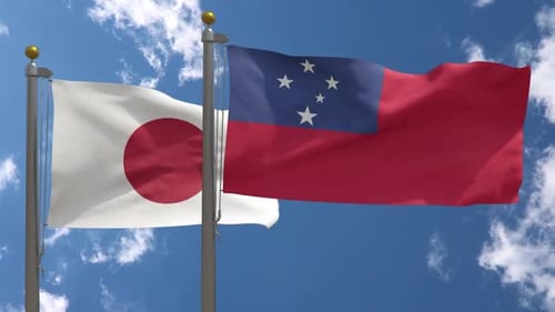 Waving Flags of Japan and Samoa against Blue Sky