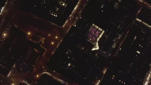 AERIAL: Slow Overhead Shot of City at Night with Lights and Traffic, Cologne, Germany