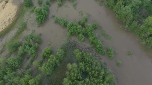 Above flooded coasts of river after heaver rain 4K drone footage