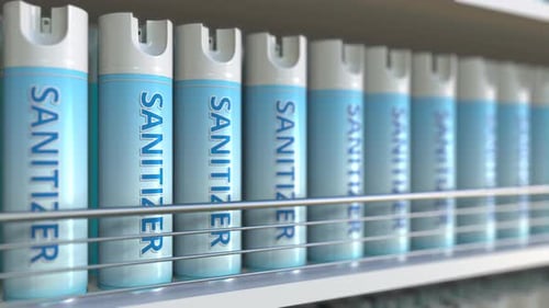 Row of Sanitizer Spray Cans on a Store Shelf