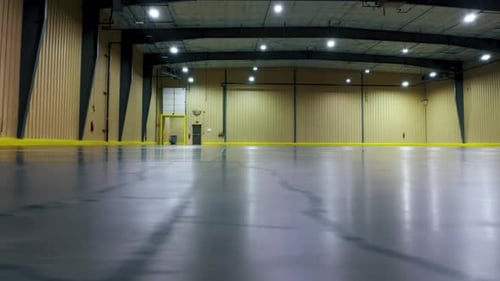 Low Angle Shot of Modern Clean Industrial Site with Large Garage Space