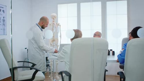 Physician Learning Colleagues Body Bone Functionson Using Xray and Human Skeleton