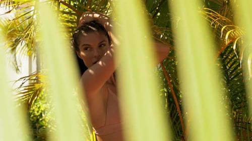Woman Posing in Tropical Vegetation during Daytime