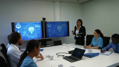 Medical Professionals Brainstorm Ideas in Modern Conference Room