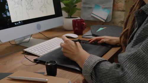 Graphic Designer Working On Drawing Table