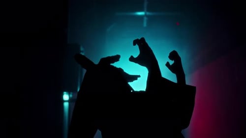 Silhouette Moving in Abstract Neon Room