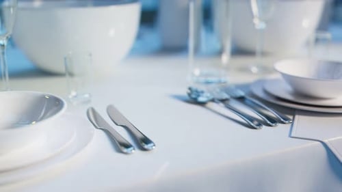 Elegant tableware at the restaurant. Dinner set at the reception. Seamless loop.
