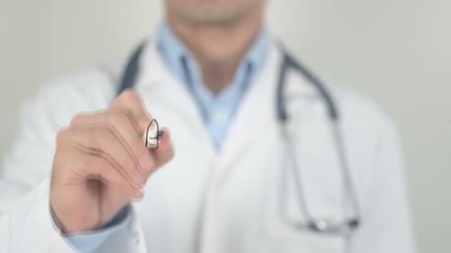 Doctor Writes Arthritis on Clear Surface