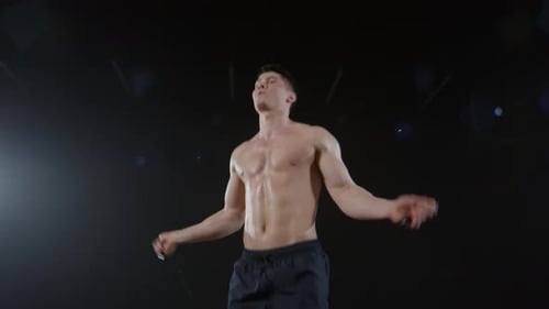 Topless Man Using Jump Rope