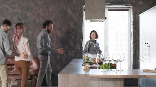 Friends Gathering Around Kitchen Counter with Dog
