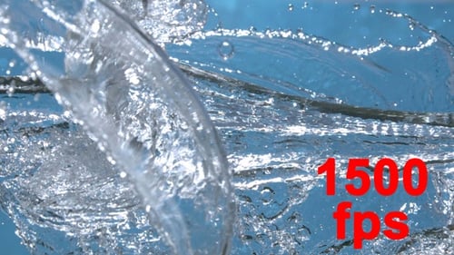 Abstract Water Splash in Slow Motion on Blue
