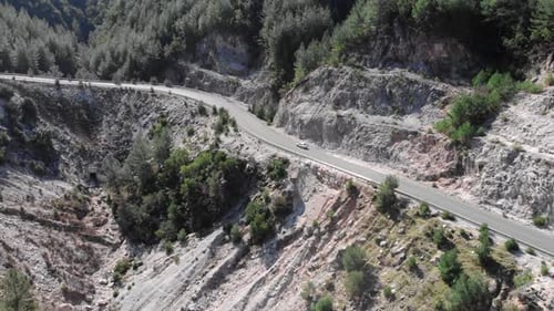 Car on empty mountain road
