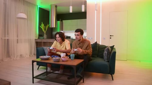 Friends Play Video Games and Celebrate a Win