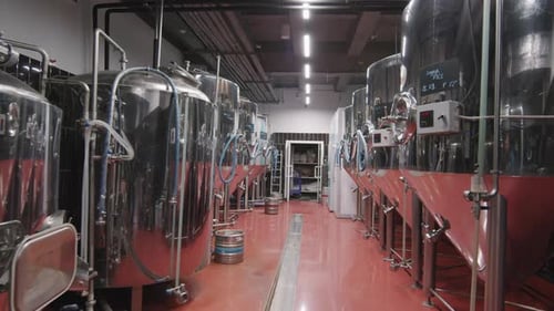 Modern Brewery Interior Featuring Stainless Steel Tanks