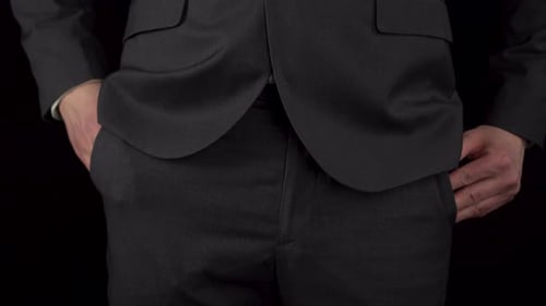 Man in Suit Pulls Out Money