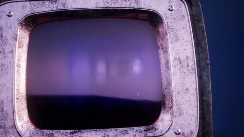 Rusty Retro Television Displaying Abstract Cosmic Scene Animation