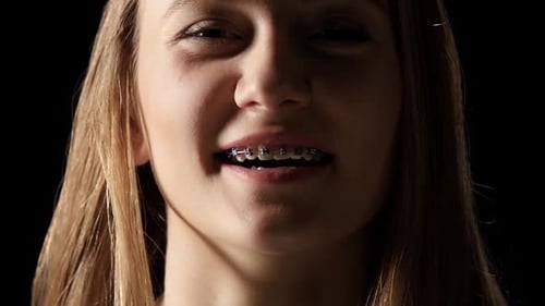 Teen Girl with Braces Smiling Close Up