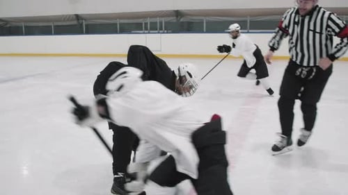 Hockey Players And Official During Face-Off