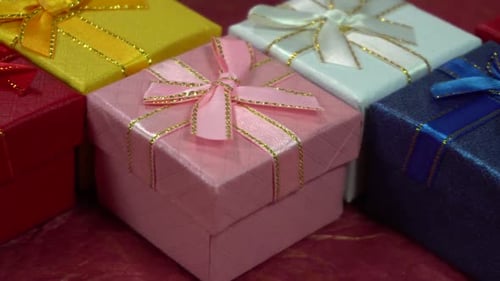 Brightly Colored Gift Boxes with Festive Ribbons