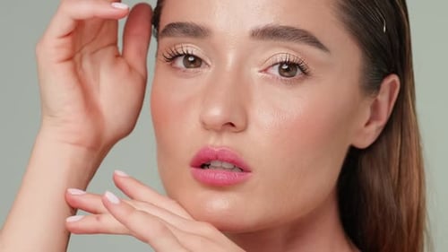 Elegant Woman Posing in Studio for Beauty Shoot