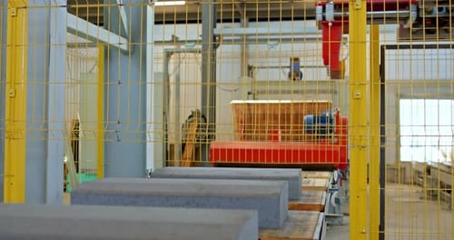 Production Conveyor Line with Concrete Road Curbs