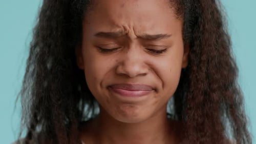 Distressed Young Woman With Wrinkled Face
