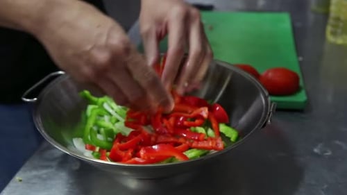 Chef Preparing Fresh Vegetables in Commercial Kitchen