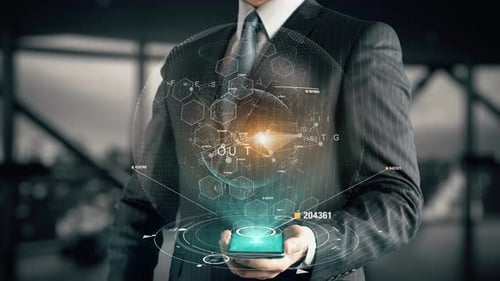 Businessman with Marketing Effectiveness Hologram Concept