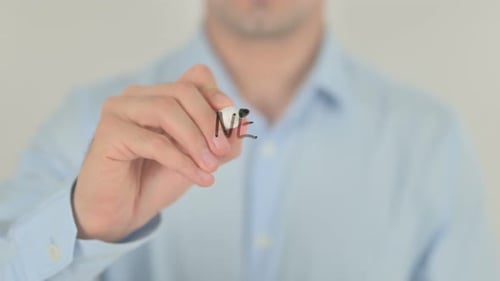 Man Writes New Instructions on Clear Surface