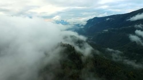 Aerial View of Tropical Mountains with Cloud Cover