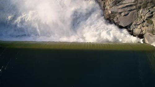 Birdseye Aerial Raging Dam Cascade Edge Reveal