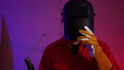 Portrait of young industrial technician in the factory.