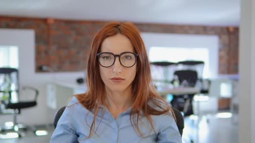 Woman Has an Idea in Office